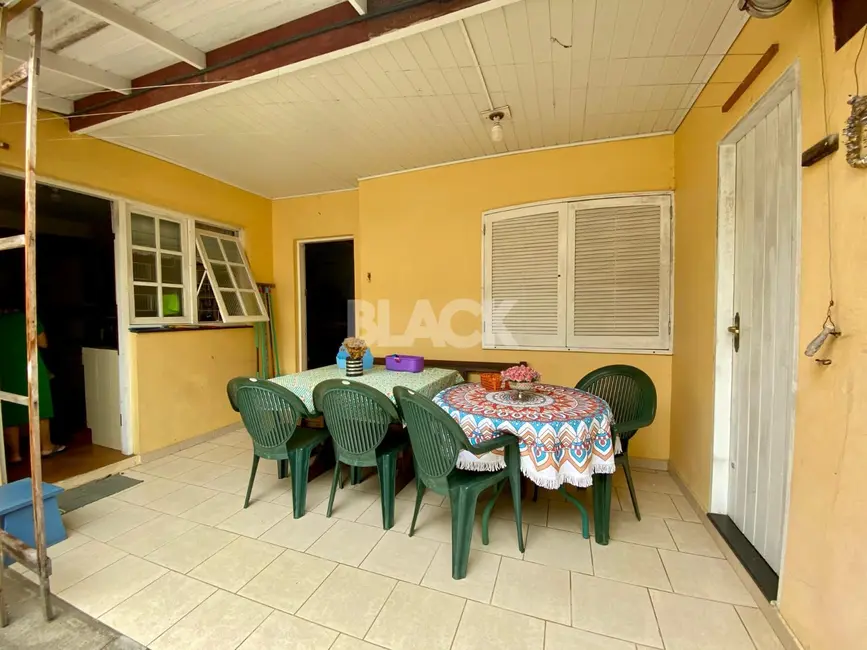 Foto 5 de Casa com 5 quartos à venda, 180m2 em Torres - RS