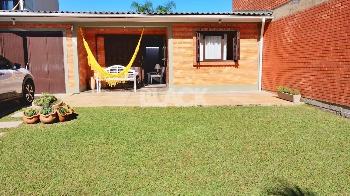 Foto 3 de Casa com 3 quartos à venda, 99m2 em Torres - RS