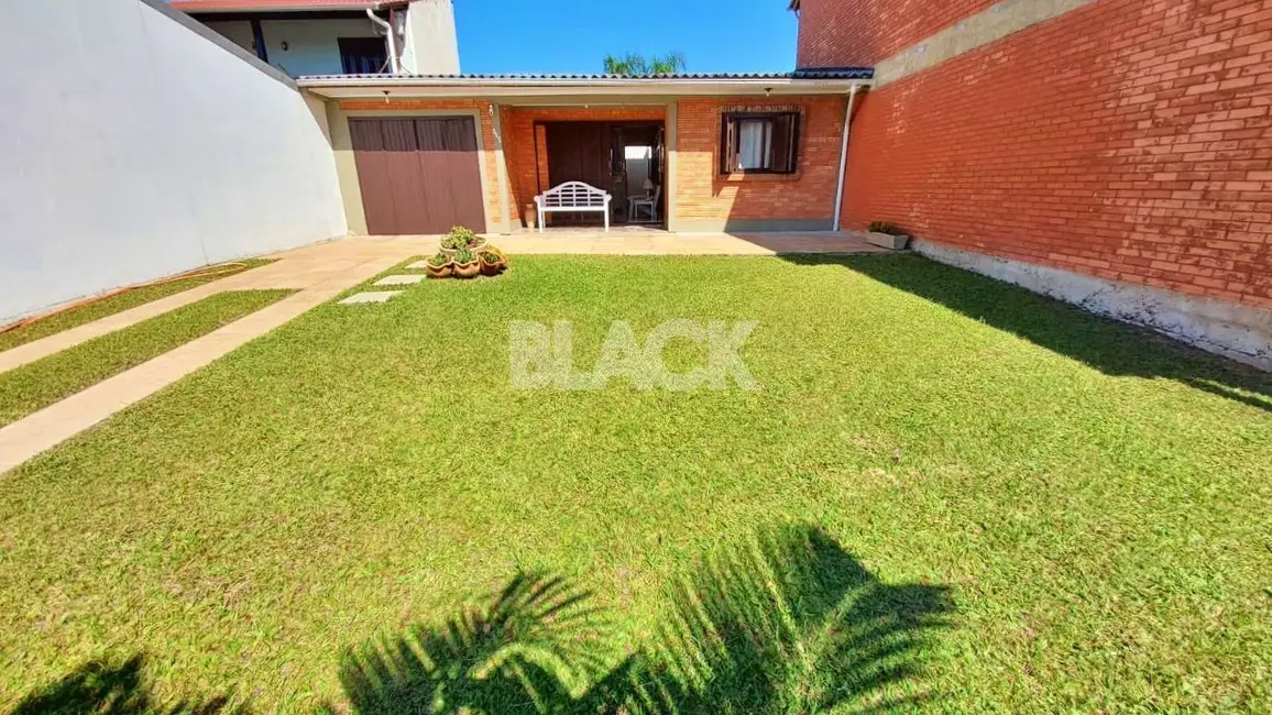 Foto 2 de Casa com 3 quartos à venda, 99m2 em Torres - RS