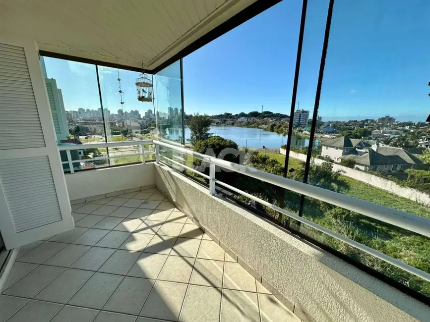 Foto 9 de Apartamento com 3 quartos à venda, 120m2 em Centro, Torres - RS