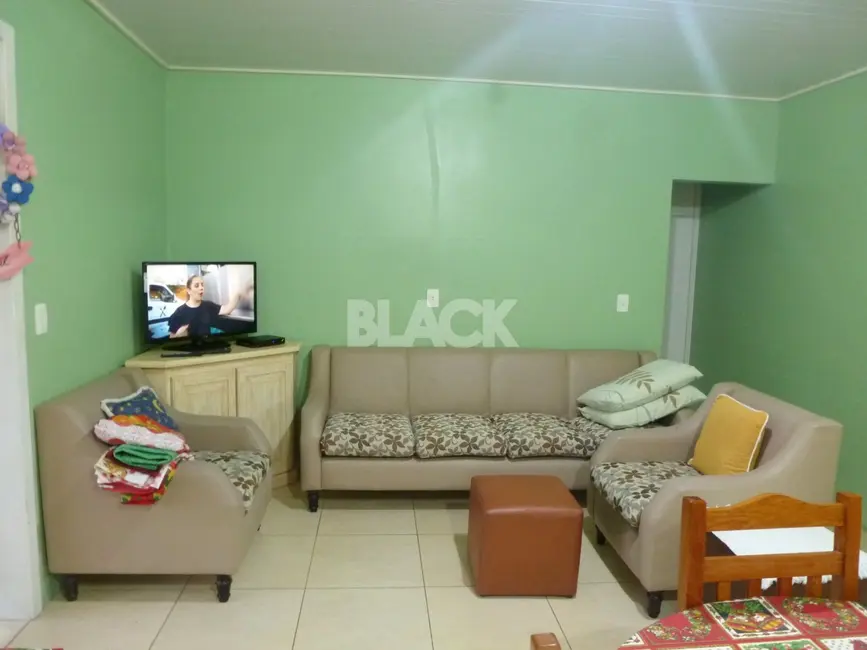 Foto 5 de Casa com 6 quartos à venda, 200m2 em Centro, Torres - RS