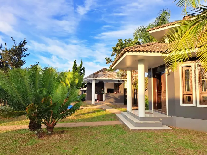 Foto 4 de Casa com 4 quartos à venda, 230m2 em Torres - RS