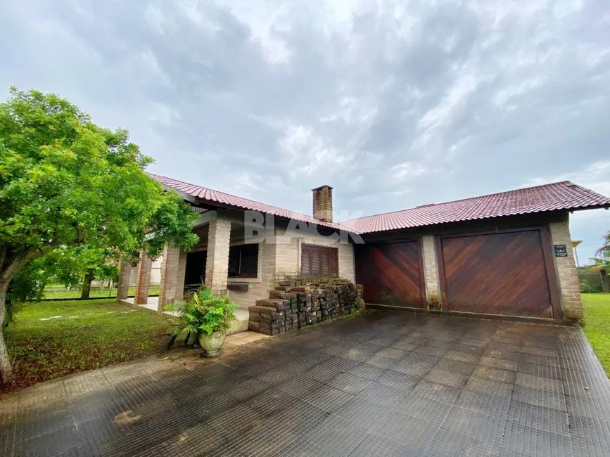 Casa com 3 quartos à venda, 280m2 em Torres - RS - imagem 1 Foto 1 de Casa com 3 quartos à venda, 280m2 em Torres - RS