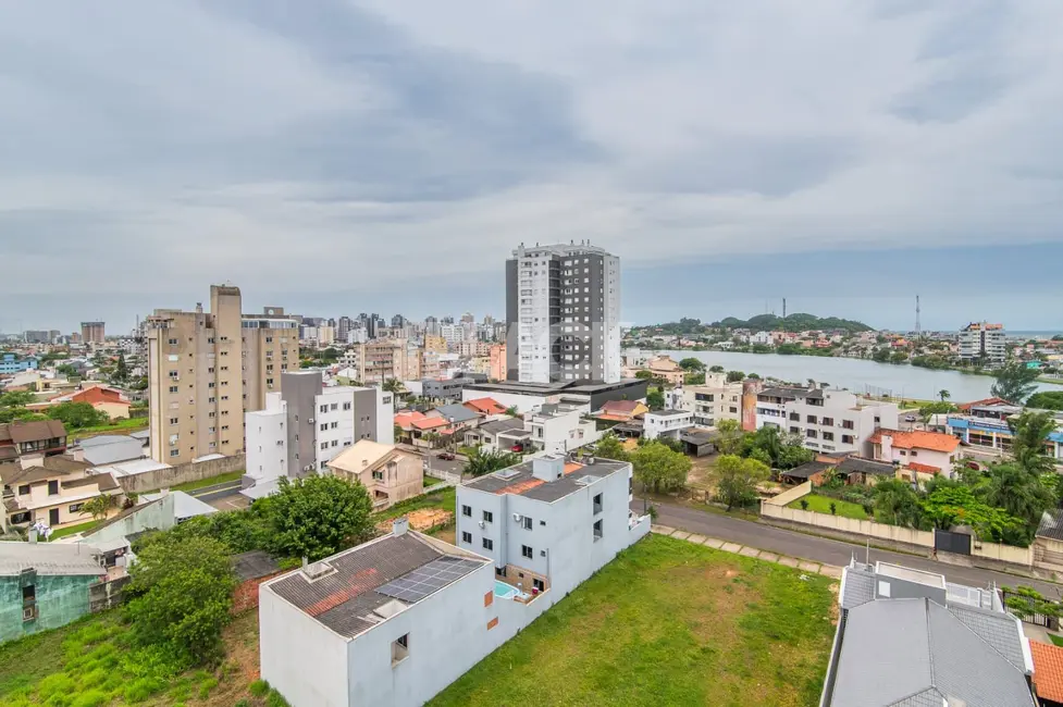Foto 4 de Cobertura com 4 quartos à venda, 172m2 em Centro, Torres - RS