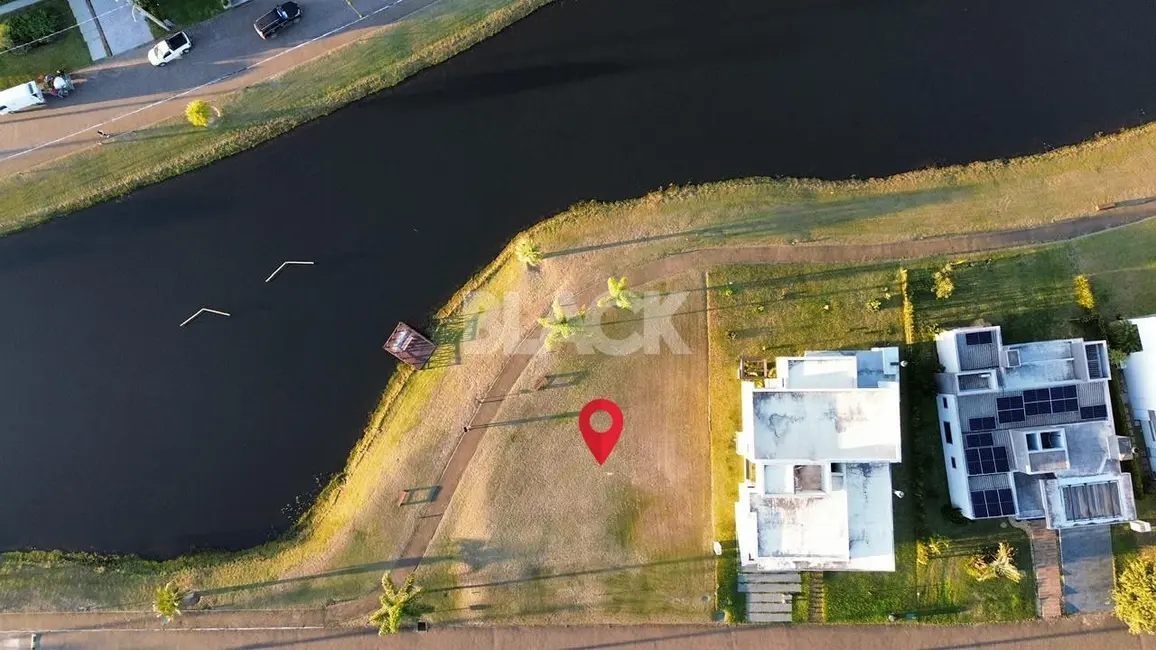 Foto 3 de Terreno / Lote à venda, 556m2 em Torres - RS