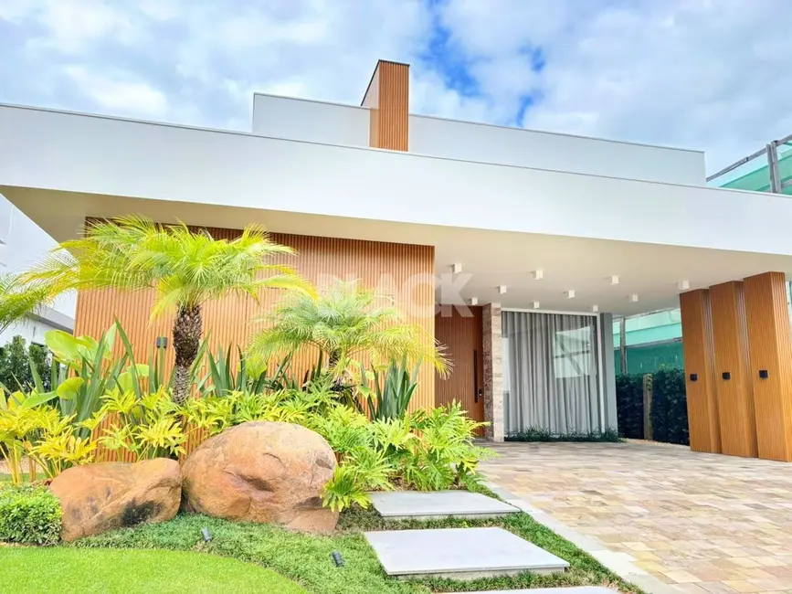 Foto 1 de Casa de Condomínio com 4 quartos à venda, 264m2 em Torres - RS