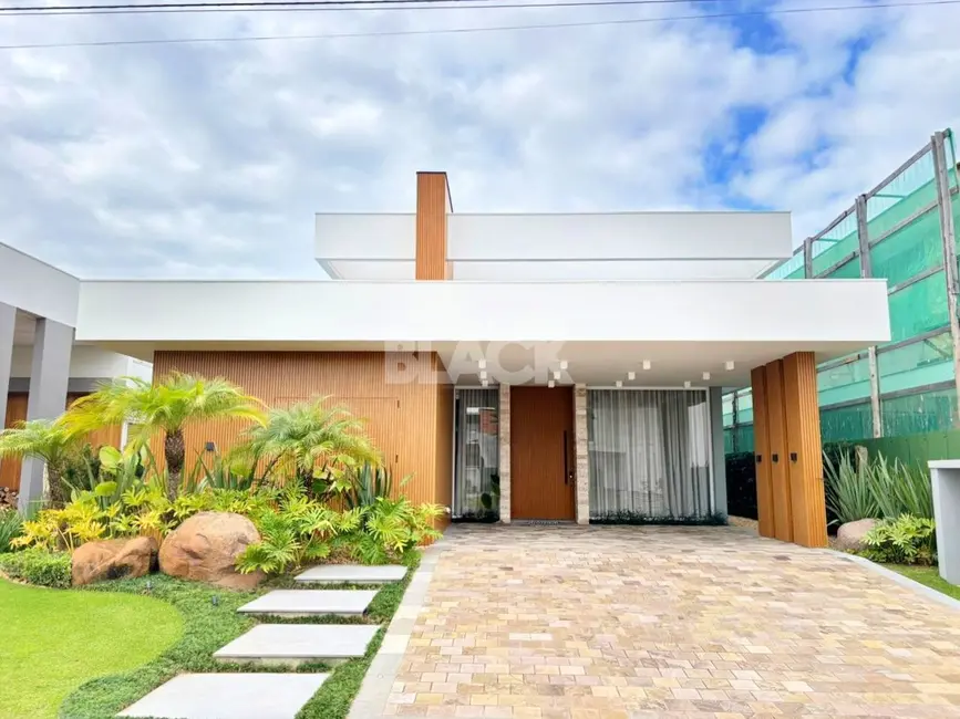 Foto 2 de Casa de Condomínio com 4 quartos à venda, 264m2 em Torres - RS