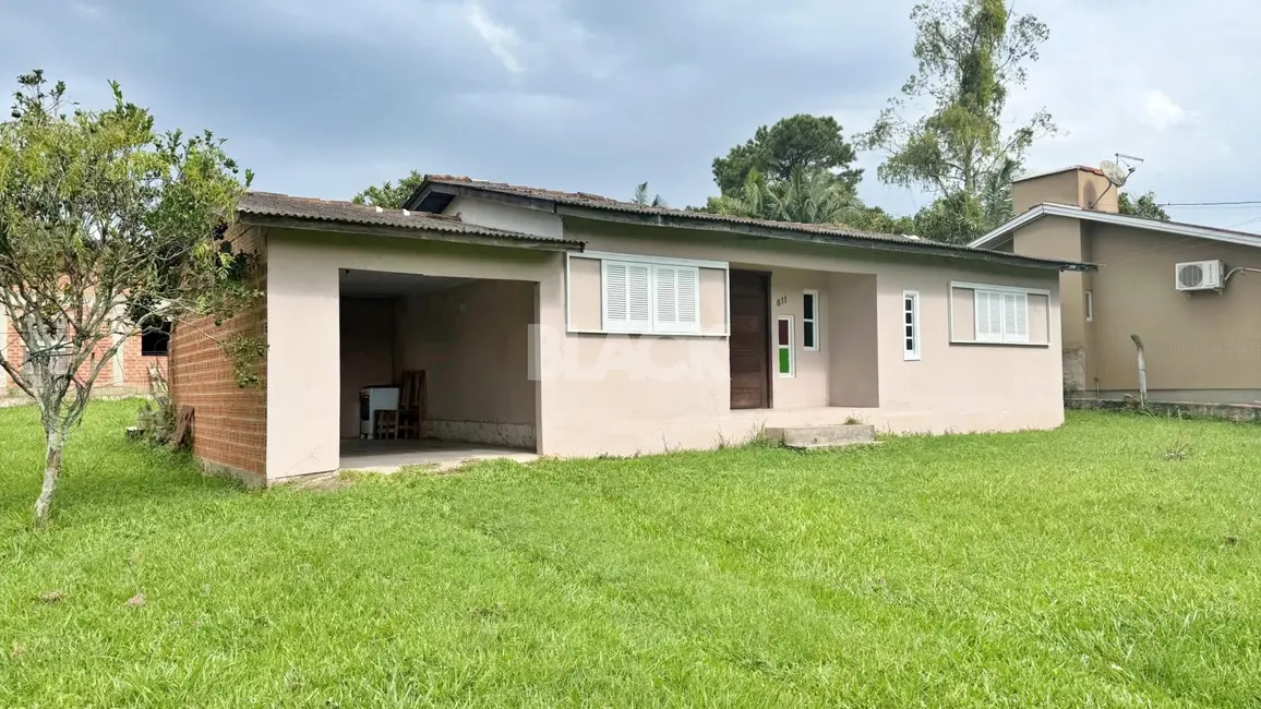 Foto 1 de Casa com 2 quartos à venda, 100m2 em Torres - RS