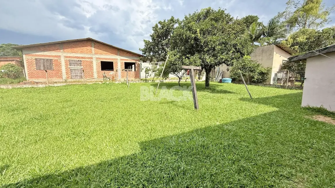 Foto 8 de Casa com 2 quartos à venda, 100m2 em Torres - RS