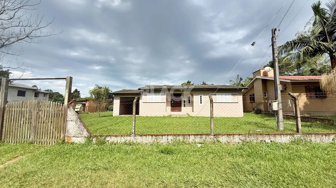Foto 2 de Casa com 2 quartos à venda, 100m2 em Torres - RS