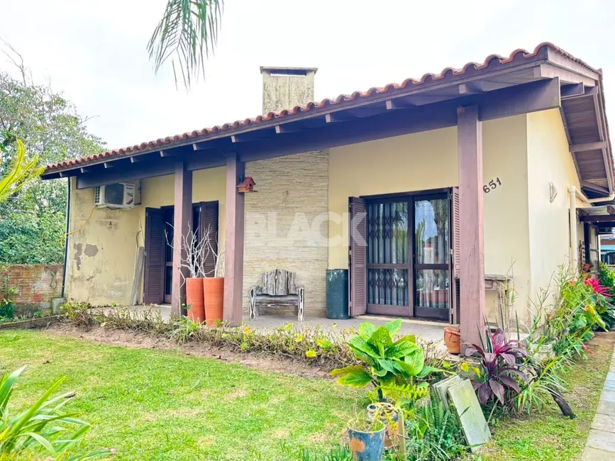 Foto 3 de Casa com 8 quartos à venda, 340m2 em Torres - RS