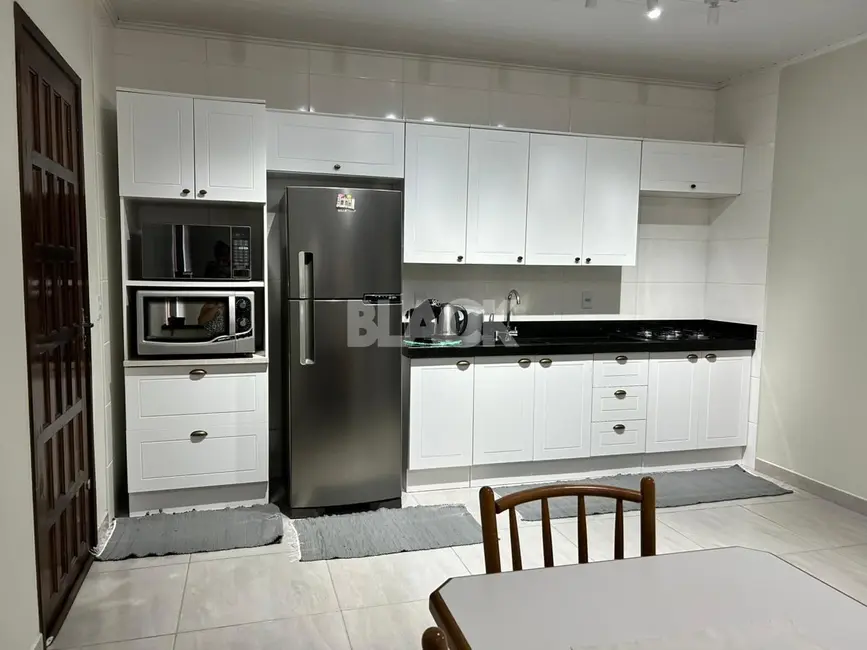 Foto 4 de Casa com 2 quartos à venda, 115m2 em Torres - RS