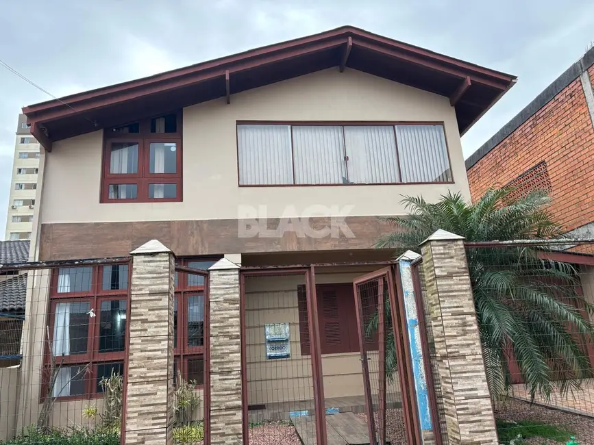 Foto 1 de Casa com 3 quartos à venda, 236m2 em Torres - RS