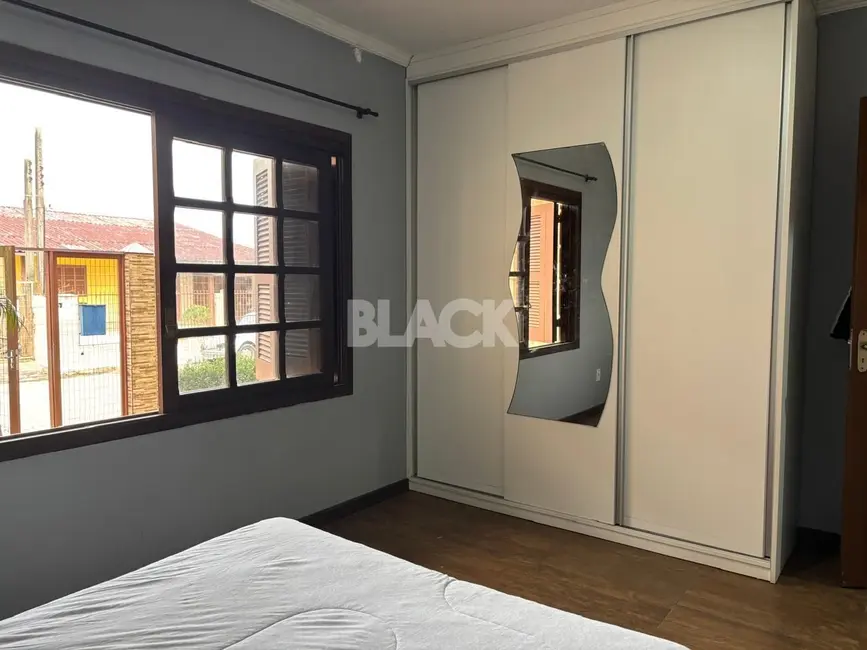 Foto 9 de Casa com 3 quartos à venda, 236m2 em Torres - RS