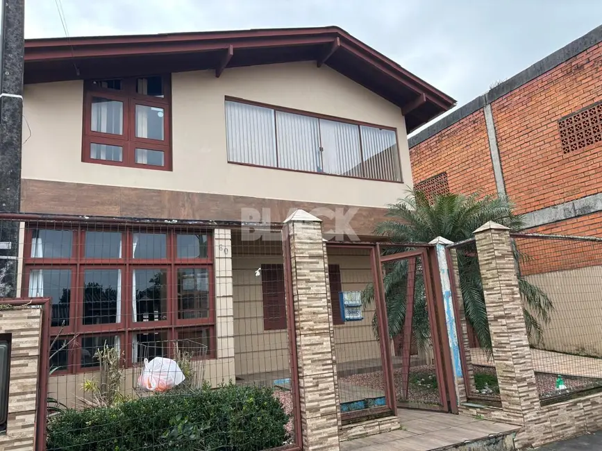 Foto 2 de Casa com 3 quartos à venda, 236m2 em Torres - RS