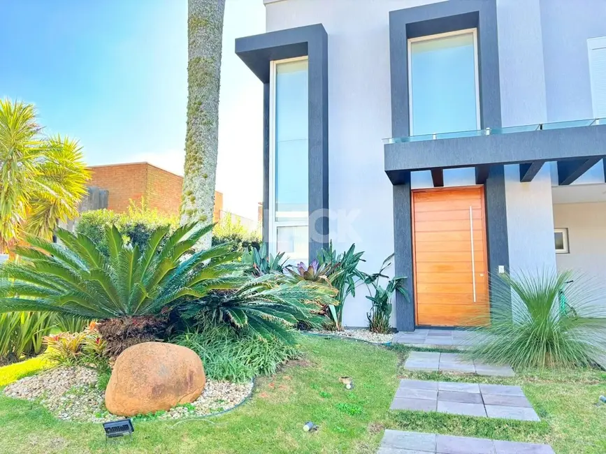 Foto 3 de Casa de Condomínio com 3 quartos à venda, 262m2 em Torres - RS