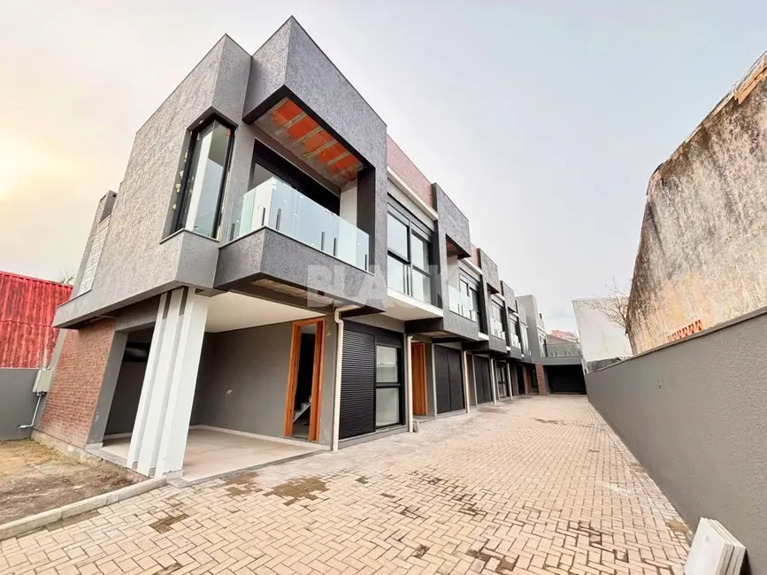 Foto 2 de Sobrado com 3 quartos à venda, 105m2 em Torres - RS