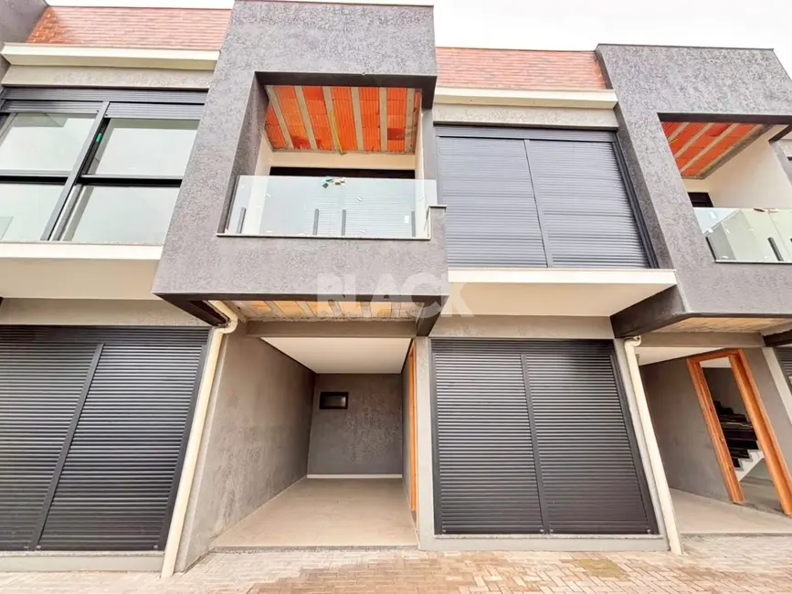 Sobrado com 3 quartos à venda, 105m2 em Torres - RS - imagem 5 Foto 5 de Sobrado com 3 quartos à venda, 105m2 em Torres - RS