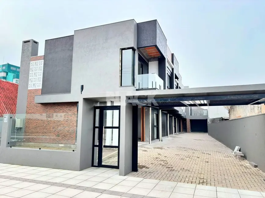 Sobrado com 3 quartos à venda, 105m2 em Torres - RS - imagem 1 Foto 1 de Sobrado com 3 quartos à venda, 105m2 em Torres - RS