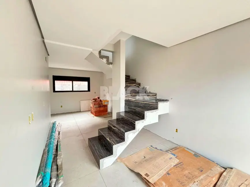 Sobrado com 3 quartos à venda, 105m2 em Torres - RS - imagem 6 Foto 6 de Sobrado com 3 quartos à venda, 105m2 em Torres - RS