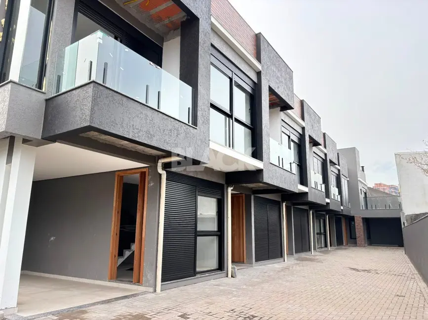 Foto 3 de Sobrado com 3 quartos à venda, 107m2 em Torres - RS