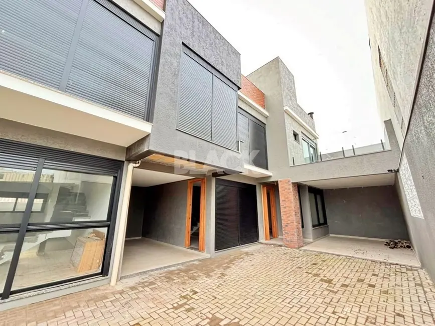 Foto 5 de Sobrado com 3 quartos à venda, 107m2 em Torres - RS