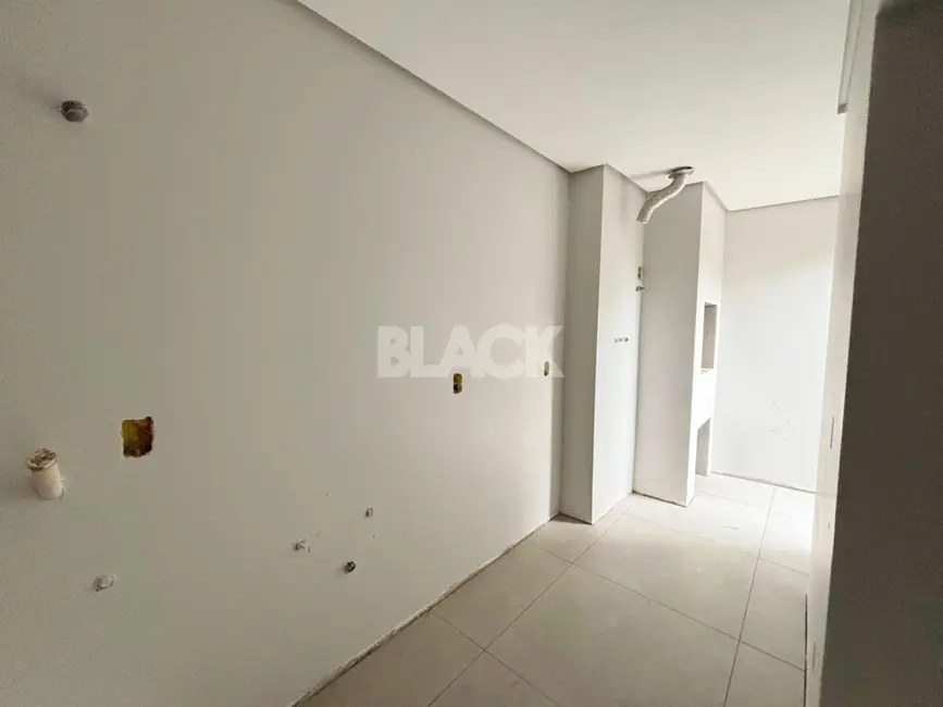Foto 9 de Sobrado com 2 quartos à venda, 137m2 em Torres - RS
