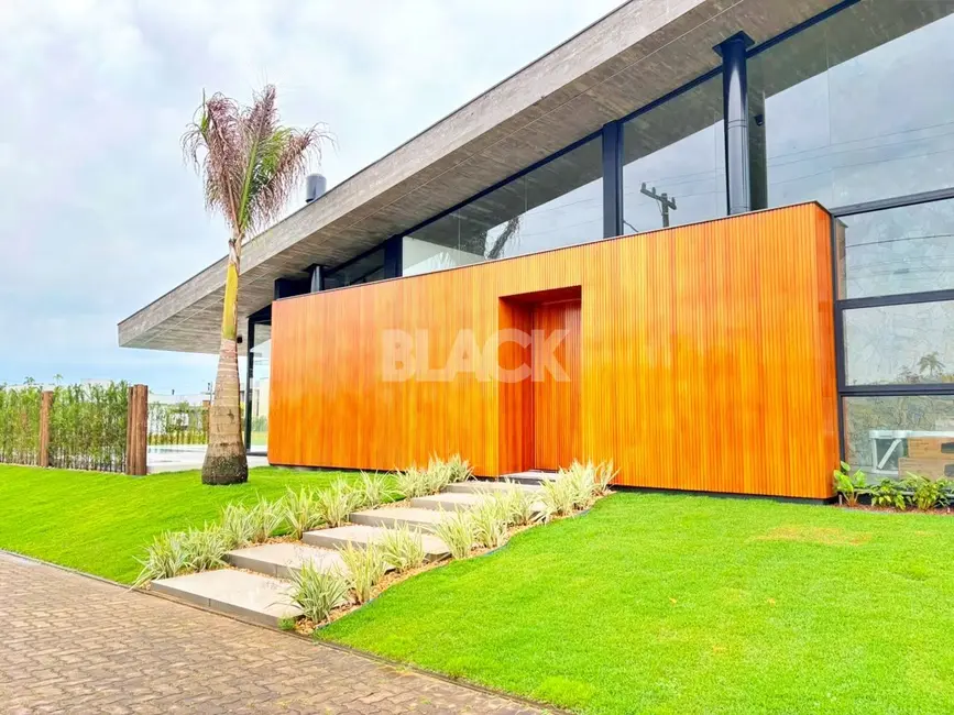 Foto 2 de Casa de Condomínio com 4 quartos à venda, 439m2 em Torres - RS