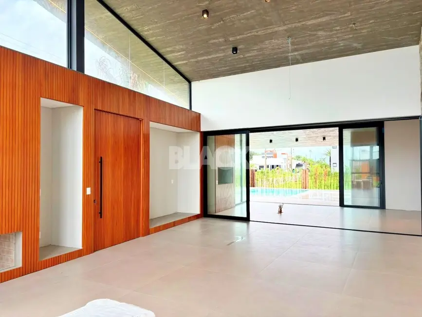 Foto 5 de Casa de Condomínio com 4 quartos à venda, 439m2 em Torres - RS
