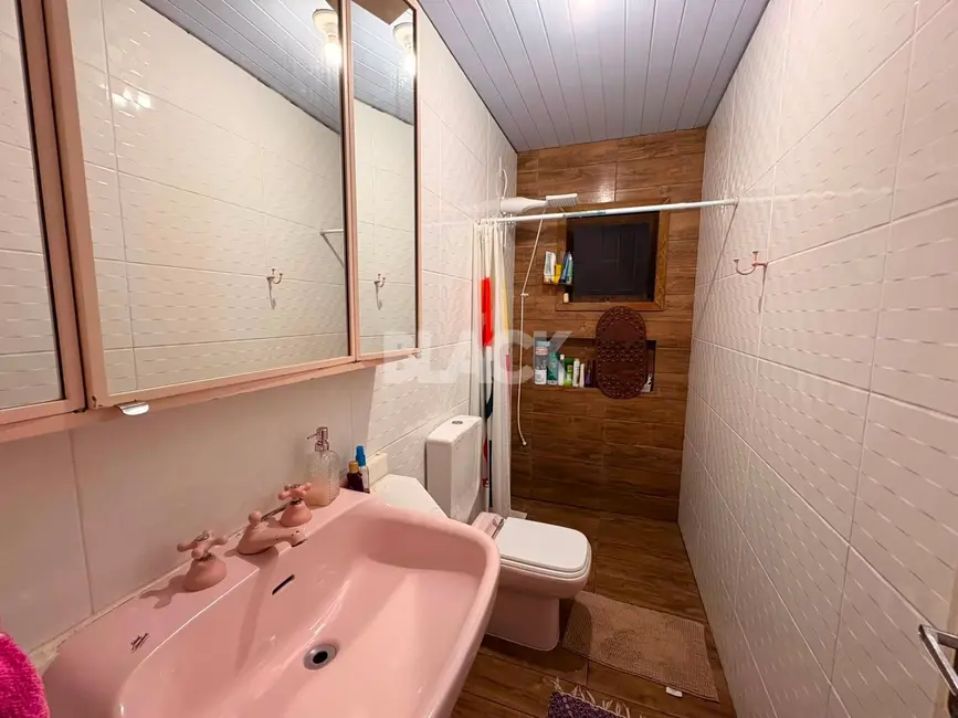 Foto 6 de Casa com 2 quartos à venda, 77m2 em Torres - RS