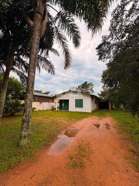 Foto 1 de Casa com 2 quartos à venda, 77m2 em Torres - RS