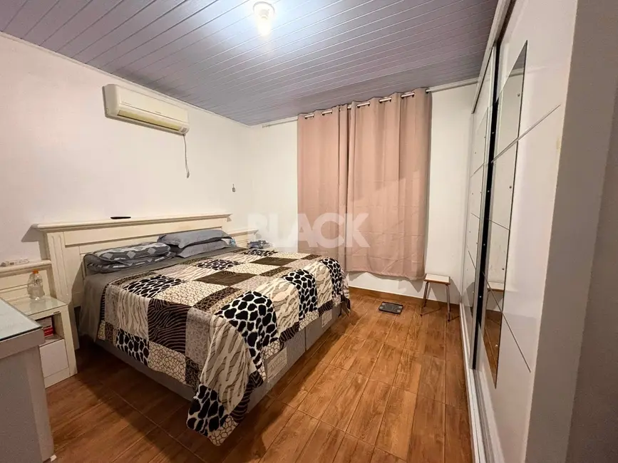 Foto 5 de Casa com 2 quartos à venda, 77m2 em Torres - RS