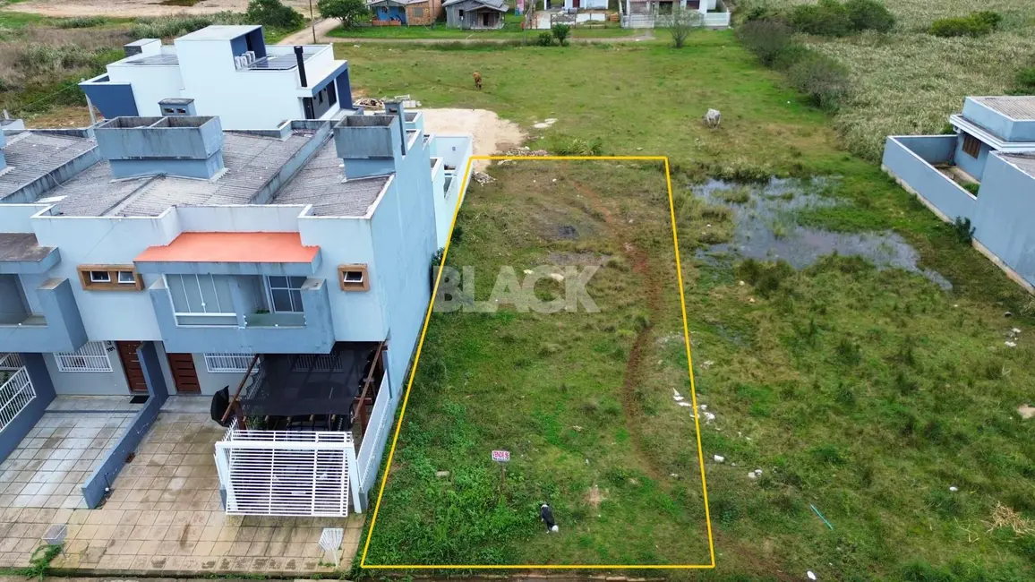 Foto 1 de Terreno / Lote à venda, 384m2 em Torres - RS
