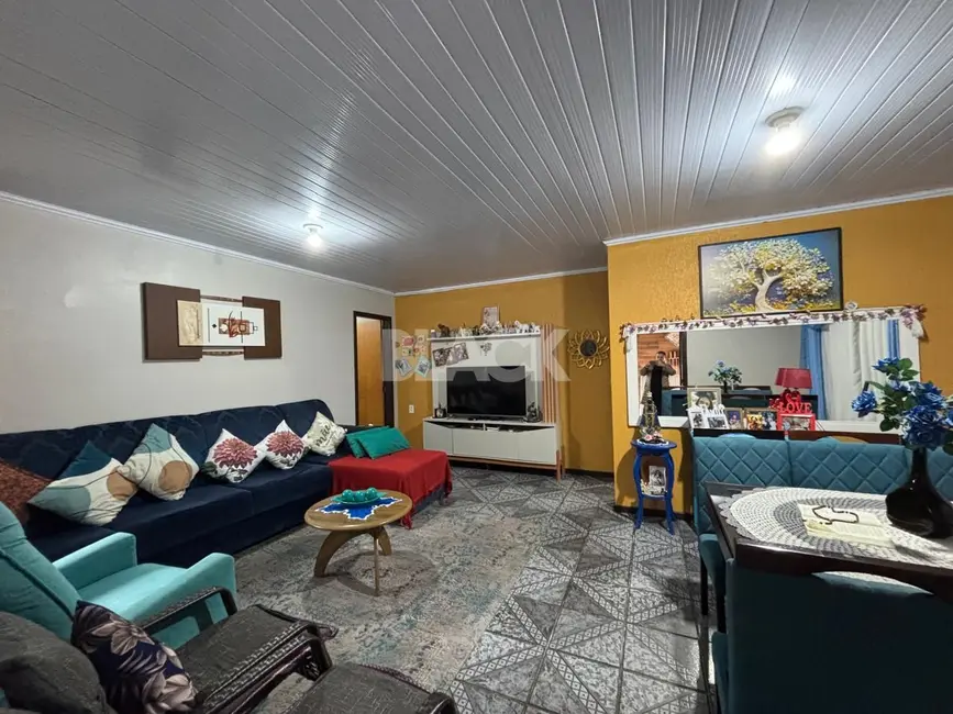 Foto 5 de Casa com 3 quartos à venda, 120m2 em Torres - RS
