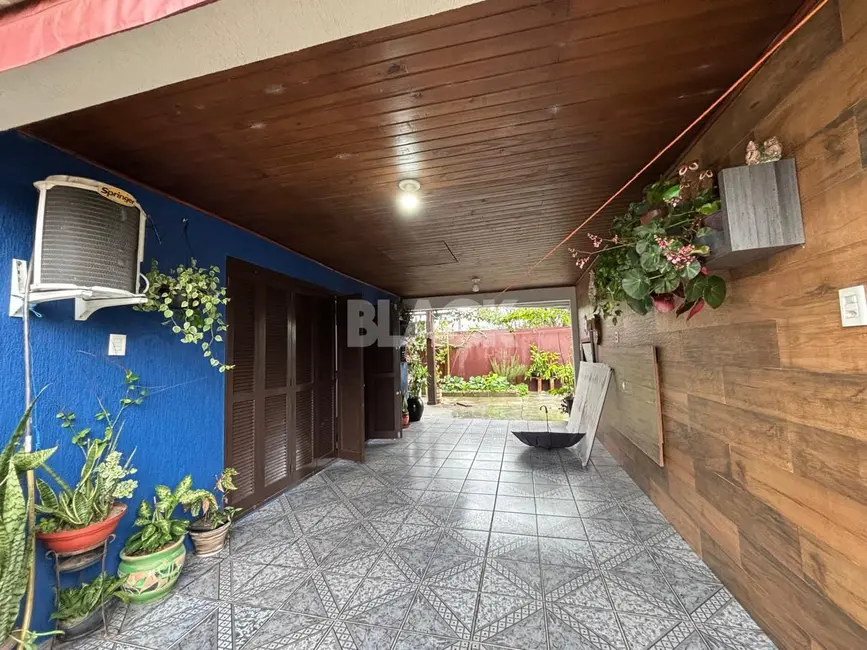 Foto 3 de Casa com 3 quartos à venda, 120m2 em Torres - RS