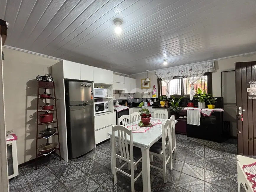 Foto 9 de Casa com 3 quartos à venda, 120m2 em Torres - RS