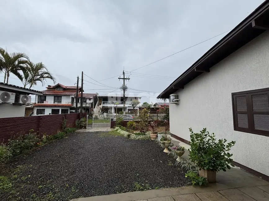 Foto 2 de Casa com 3 quartos à venda, 120m2 em Torres - RS