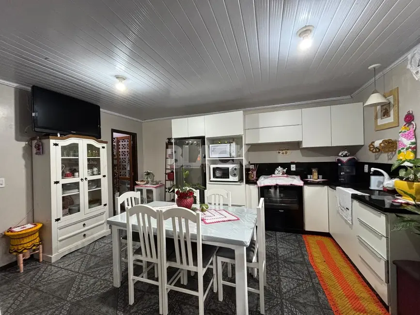Foto 8 de Casa com 3 quartos à venda, 120m2 em Torres - RS
