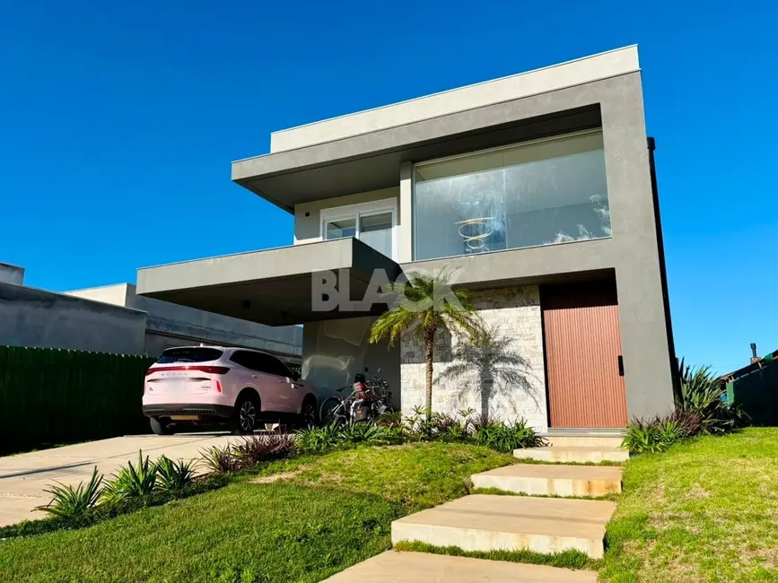Foto 3 de Casa de Condomínio com 4 quartos à venda, 162m2 em Torres - RS