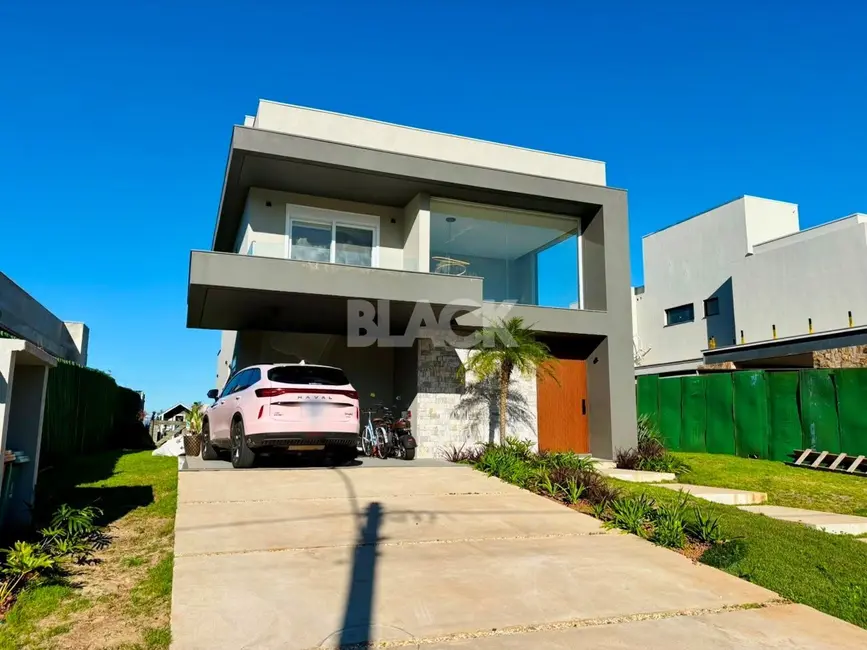 Foto 2 de Casa de Condomínio com 4 quartos à venda, 162m2 em Torres - RS