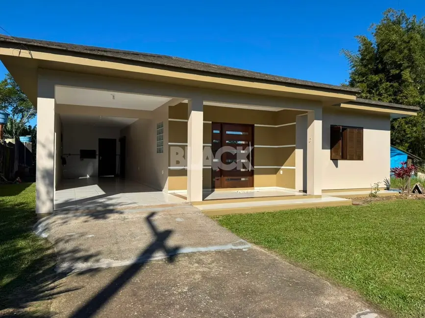 Foto 3 de Casa com 3 quartos à venda, 134m2 em Torres - RS