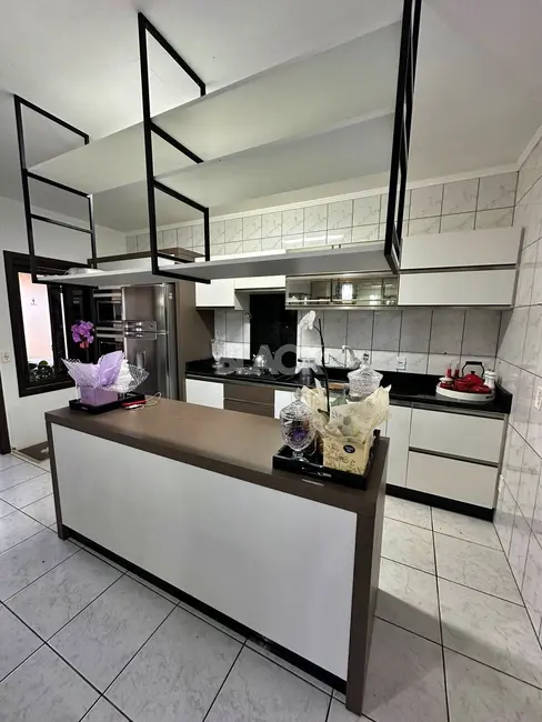 Foto 9 de Sobrado com 3 quartos à venda, 152m2 em Centro, Torres - RS
