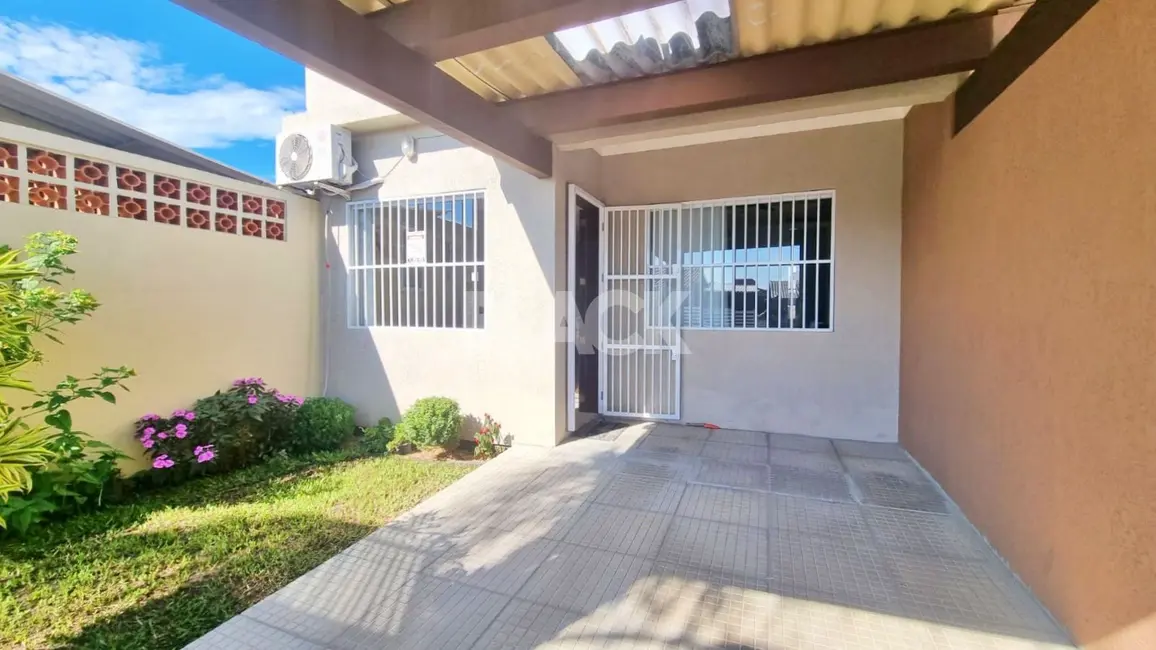 Foto 2 de Casa com 2 quartos à venda, 100m2 em Torres - RS
