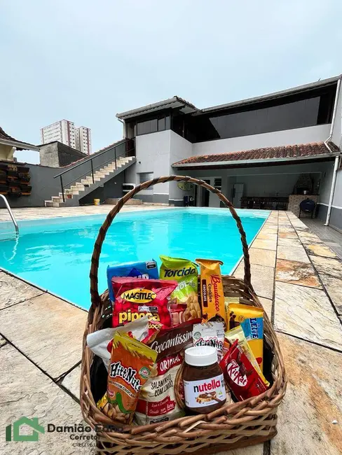 Foto 2 de Casa com 4 quartos à venda, 362m2 em Tupi, Praia Grande - SP