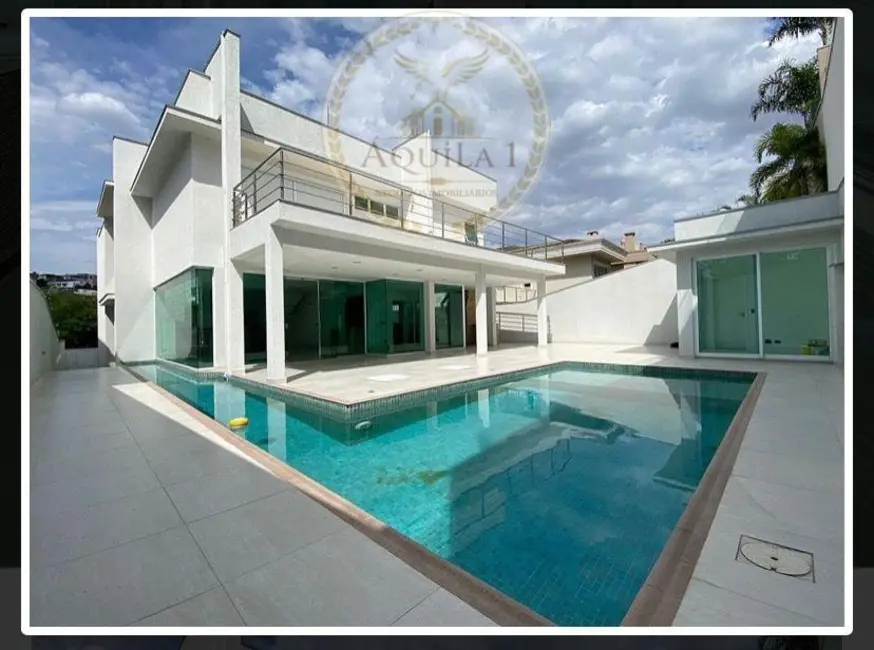 Foto 1 de Casa de Condomínio com 4 quartos para alugar, 488m2 em Centro Comercial Jubran, Barueri - SP