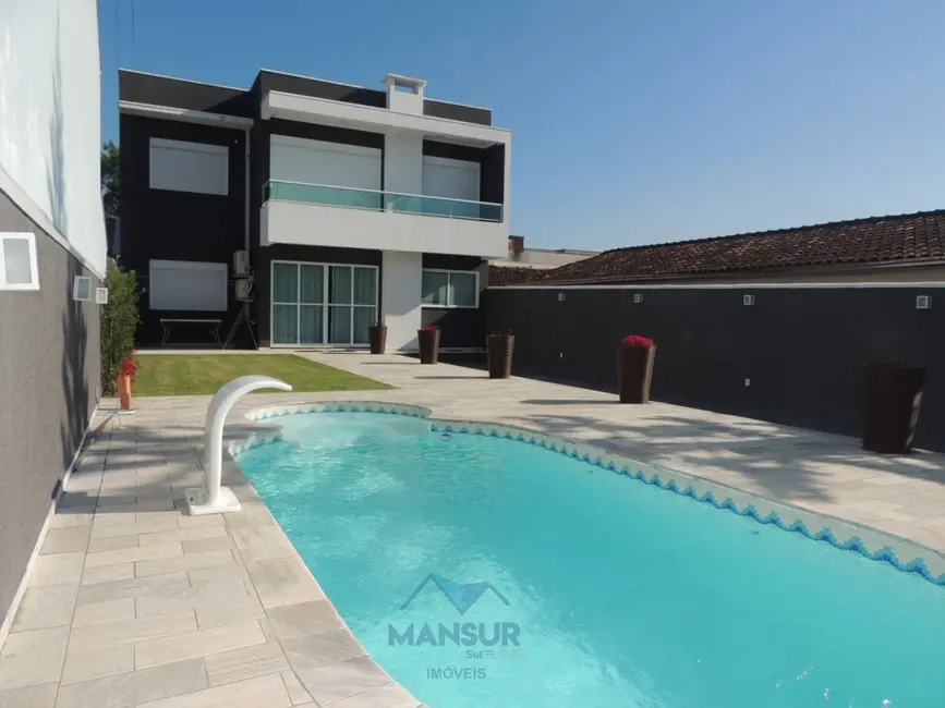 Sobrado com 4 quartos à venda, 300m2 em Matinhos - PR - imagem 6 Foto 6 de Sobrado com 4 quartos à venda, 300m2 em Matinhos - PR