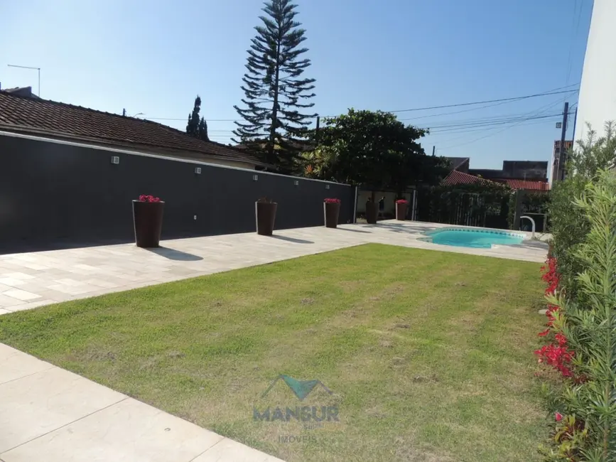 Sobrado com 4 quartos à venda, 300m2 em Matinhos - PR - imagem 8 Foto 8 de Sobrado com 4 quartos à venda, 300m2 em Matinhos - PR