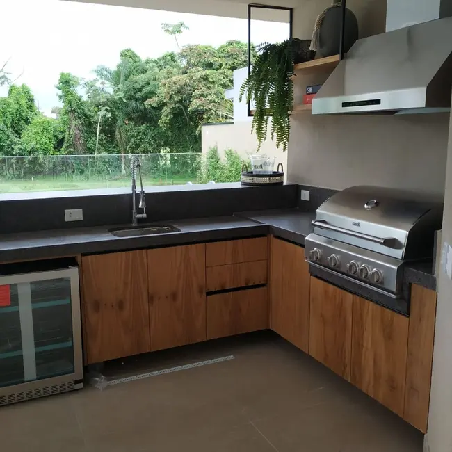 Foto 8 de Casa com 7 quartos à venda, 413m2 em Riviera de São Lourenço, Bertioga - SP