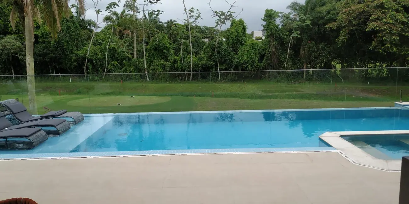 Foto 6 de Casa com 7 quartos à venda, 413m2 em Riviera de São Lourenço, Bertioga - SP