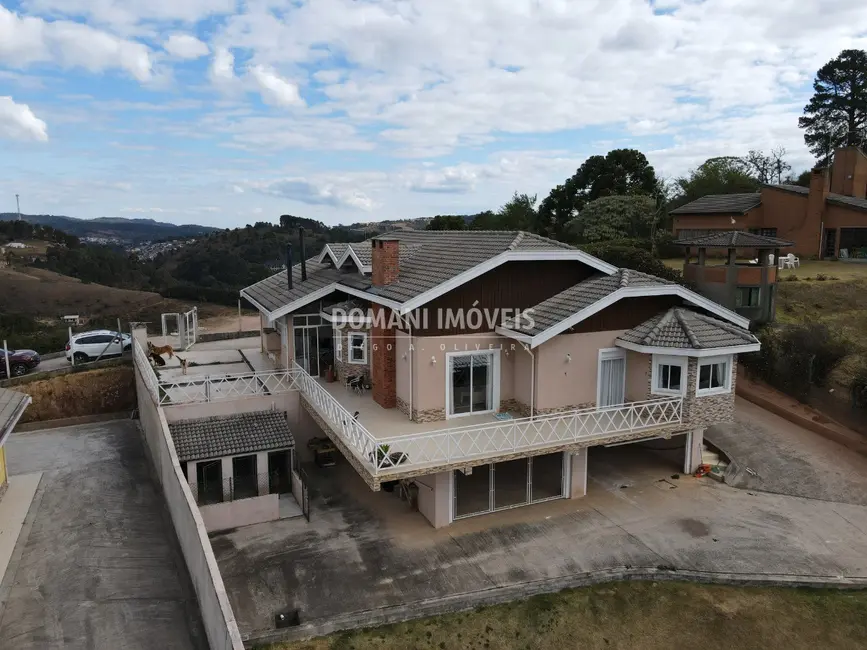 Foto 2 de Casa com 6 quartos à venda, 263m2 em Campos Do Jordao - SP